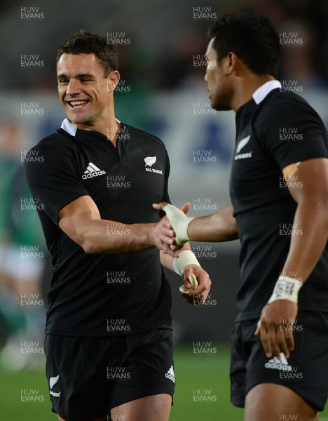 Dan Carter congratulates Julian Savea after a hard  tackle on Ireland fulback Rob Kearney during the 1st Rugby Union test match, All Blacks v Ireland at Eden Park, Auckland, New Zealand on Saturday 9 June 2012 