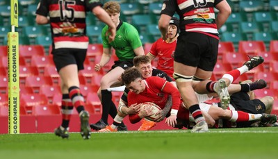 170426 - Amman United v Pontypool United, Road to Principality Finals, Boys U18 Cup Final - Cian Evans of Amman United is tackled short of the line