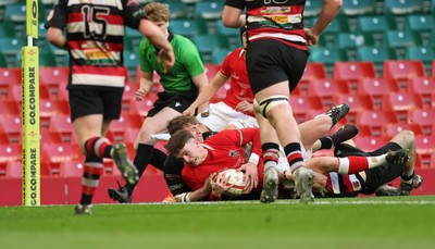 170426 - Amman United v Pontypool United, Road to Principality Finals, Boys U18 Cup Final - Cian Evans of Amman United is tackled short of the line