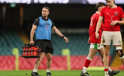 170426 - Amman United v Pontypool United, Road to Principality Finals, Boys U18 Cup Final - Wales rugby legend and Wales Mens record try scorer Shane Williams fulfilling his role as water carrier for  Amman United