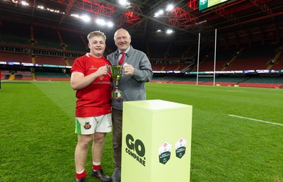 170426 - Amman United v Pontypool United, Road to Principality Finals, Boys U18 Cup Final - Ceian Lewis, Co-captain  of Amman United is presented with the trophy by Terry Cobner, President of the WRU