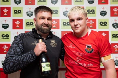 170426 - Amman United v Pontypool United, Road to Principality Finals, Boys U18 Cup Final - Player of the Match Cole Lacey of Amman United celebrate the win after being presented with the trophy