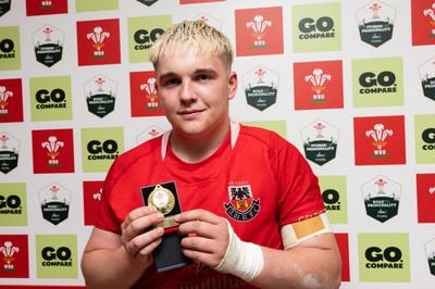 170426 - Amman United v Pontypool United, Road to Principality Finals, Boys U18 Cup Final - Player of the Match Cole Lacey of Amman United celebrate the win after being presented with the trophy