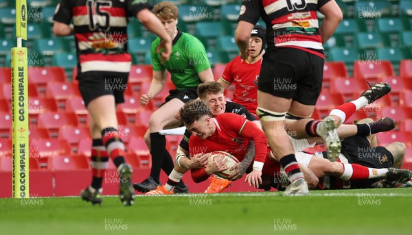 170426 - Amman United v Pontypool United, Road to Principality Finals, Boys U18 Cup Final - Cian Evans of Amman United is tackled short of the line