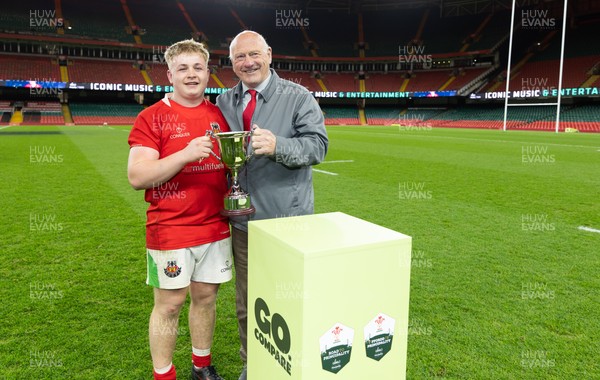 170426 - Amman United v Pontypool United, Road to Principality Finals, Boys U18 Cup Final - Ceian Lewis, Co-captain  of Amman United is presented with the trophy by Terry Cobner, President of the WRU