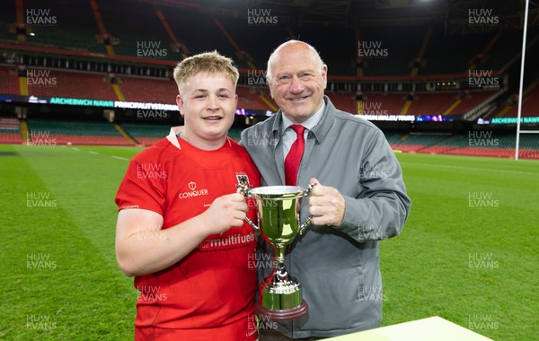 170426 - Amman United v Pontypool United, Road to Principality Finals, Boys U18 Cup Final - Ceian Lewis, Co-captain  of Amman United is presented with the trophy by Terry Cobner, President of the WRU