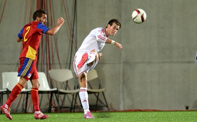 090914 - Andorra v Wales - 2016 Euro Qualifier -Gareth Bale of Wales crosses a ball