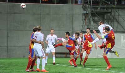 090914 - Andorra v Wales - 2016 Euro Qualifier -Gareth Bale of Wales heads a ball at goal