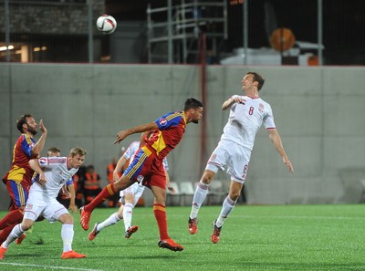 090914 - Andorra v Wales - 2016 Euro Qualifier -Andy King of Wales heads a ball at goal