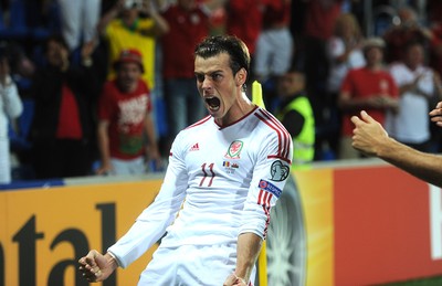 090914 - Andorra v Wales - 2016 Euro Qualifier -Gareth Bale of Wales celebrates his second goal