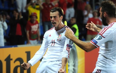 090914 - Andorra v Wales - 2016 Euro Qualifier -Gareth Bale of Wales celebrates his second goal