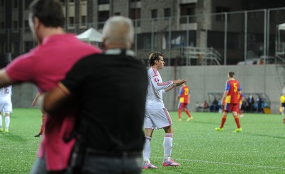 090914 - Andorra v Wales - 2016 Euro Qualifier -Gareth Bale of Wales calms his teams fans following his second goal