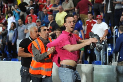 090914 - Andorra v Wales - 2016 Euro Qualifier -Wales fans invade the pitch following Gareth Bale second goal