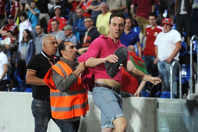 090914 - Andorra v Wales - 2016 Euro Qualifier -Wales fans invade the pitch following Gareth Bale second goal