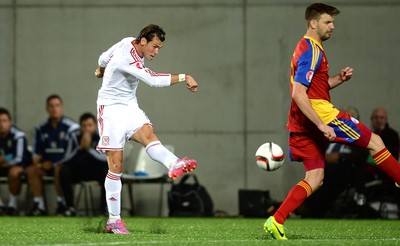 090914 - Andorra v Wales - 2016 Euro Qualifier -Gareth Bale of Wales tries a shot at goal