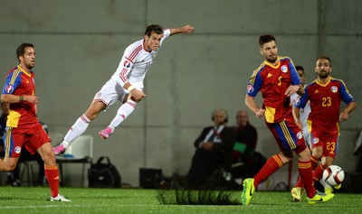 090914 - Andorra v Wales - 2016 Euro Qualifier -Gareth Bale of Wales tries a shot at goal
