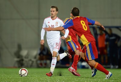 090914 - Andorra v Wales - 2016 Euro Qualifier -Aaron Ramsey of Wales looks for a way around Marcio Vieira of Andorra