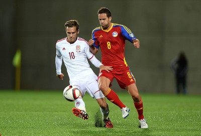 090914 - Andorra v Wales - 2016 Euro Qualifier -Aaron Ramsey of Wales is tackled by Marcio Vieira of Andorra