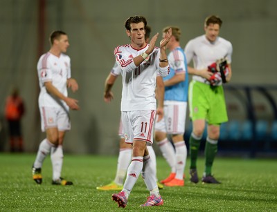090914 - Andorra v Wales - 2016 Euro Qualifier -Gareth Bale of Wales applauds the crowd at at the end of the game