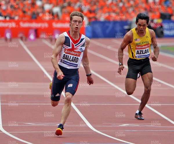 280713 - Sainsbury's Anniversary Games International Para Challenge at Olympic Stadium - Graeme Ballard wins the Mens 100m T36 Final