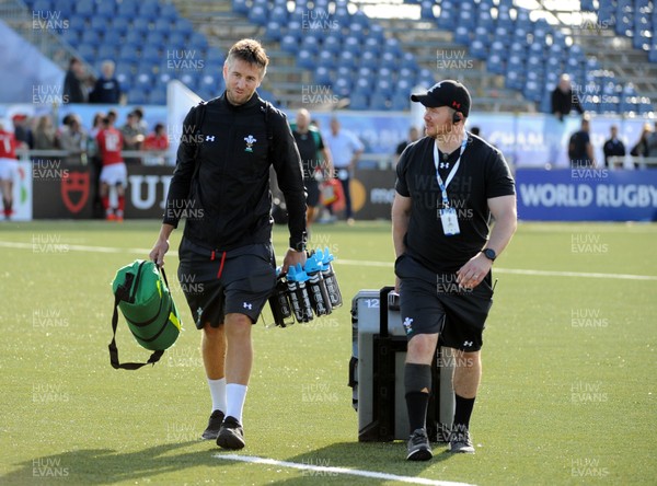 040619 - Argentina U20 v Wales U20 - World Rugby Under 20 Championship -  Defence coach Andrew Bishop (L) leaves the field at the end of the match