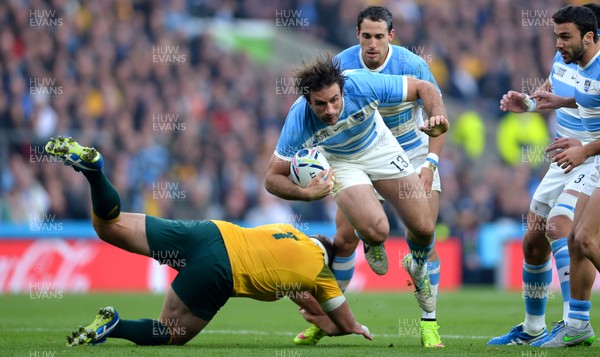 251015 - Argentina v Australia - Rugby World Cup Semi Final 2015 -Marcelo Bosch of Argentina is tackled by James Slipper of Australia