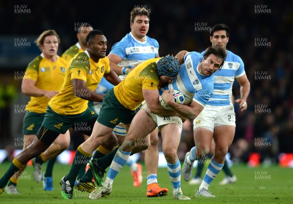 251015 - Argentina v Australia - Rugby World Cup Semi Final 2015 -Marcelo Bosch of Argentina is tackled by David Pocock of Australia