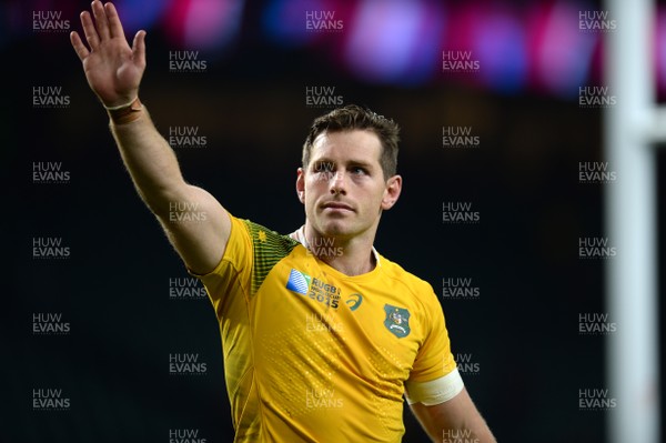 251015 - Argentina v Australia - Rugby World Cup Semi Final 2015 -Bernard Foley of Australia waves to the crowd at the end of the game