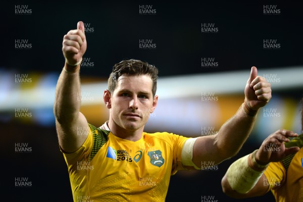 251015 - Argentina v Australia - Rugby World Cup Semi Final 2015 -Bernard Foley of Australia waves to the crowd at the end of the game