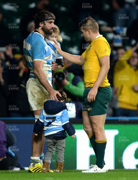 251015 - Argentina v Australia - Rugby World Cup Semi Final 2015 -Drew Mitchell and Juan Fernandez Lobbe of Argentina at the end of the game