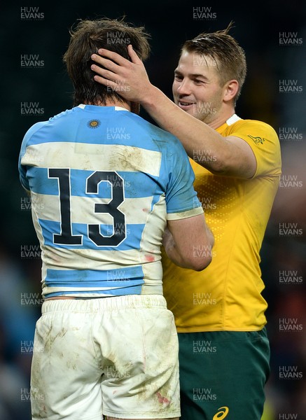 251015 - Argentina v Australia - Rugby World Cup Semi Final 2015 -Drew Mitchell and Marcelo Bosch of Argentina at the end of the game