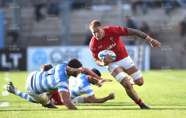 090618 - Argentina v Wales - International Rugby Union - Ross Moriarty of Wales is tackled by Marcos Kremer of Argentina