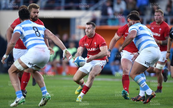 090618 - Argentina v Wales - International Rugby Union - Gareth Davies of Wales gets the ball away