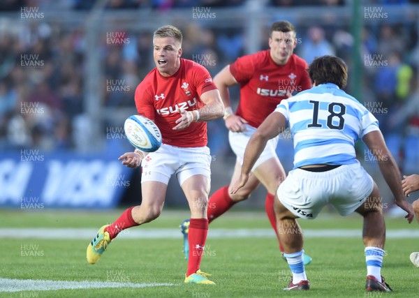090618 - Argentina v Wales - International Rugby Union - Gareth Anscombe of Wales gets the ball away