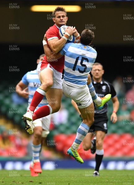 100721 - Argentina v Wales - International Rugby - Hallam Amos of Wales competes in the air with Juan Cruz Mallia of Argentina