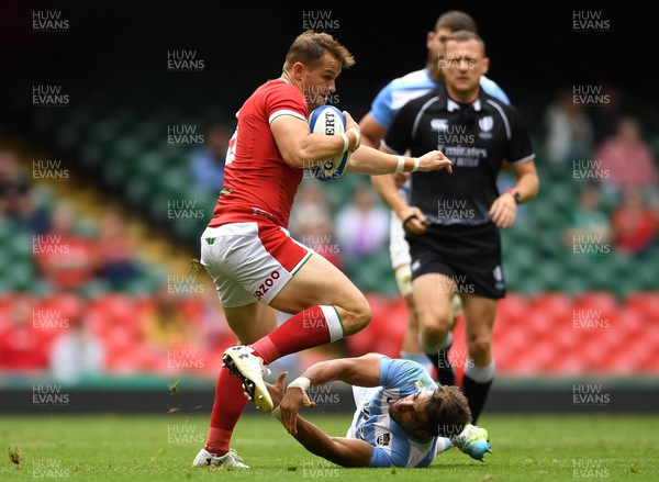 100721 - Argentina v Wales - International Rugby - Hallam Amos of Wales is tackled by Juan Cruz Mallia of Argentina