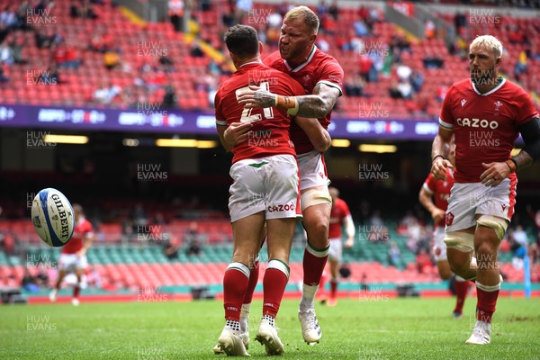 100721 - Argentina v Wales - International Rugby - Tomos Williams of Wales celebrates scoring try with Ross Moriarty (right)