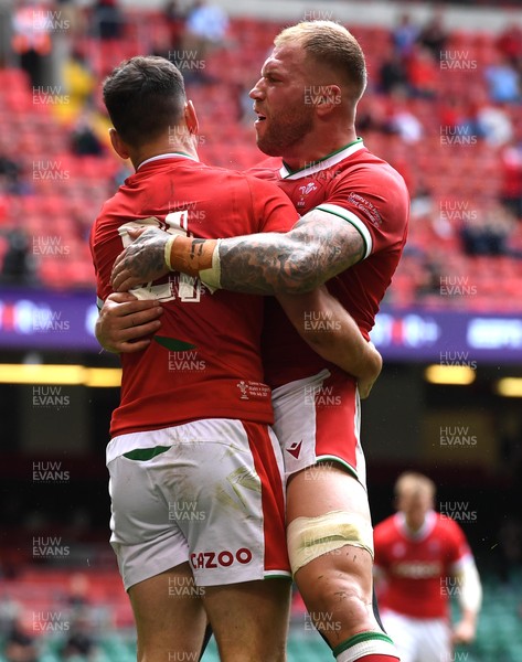100721 - Argentina v Wales - International Rugby - Tomos Williams of Wales celebrates scoring try with Ross Moriarty (right)