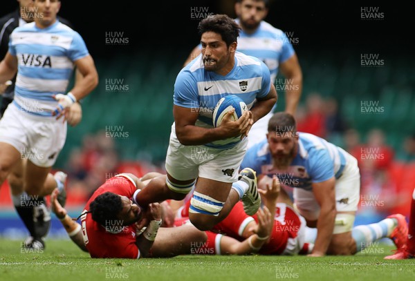 100721 - Argentina v Wales - Summer International Series - Rodrigo Bruni of Argentina is tackled by Willis Halaholo of Wales