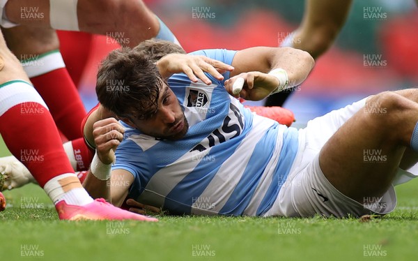 100721 - Argentina v Wales - Summer International Series - Juan Cruz Mallia of Argentina is given a red card for this tackle on Kieran Hardy of Wales