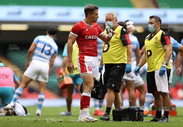 100721 - Argentina v Wales - Summer International Series - Kieran Hardy of Wales is looked at by medics
