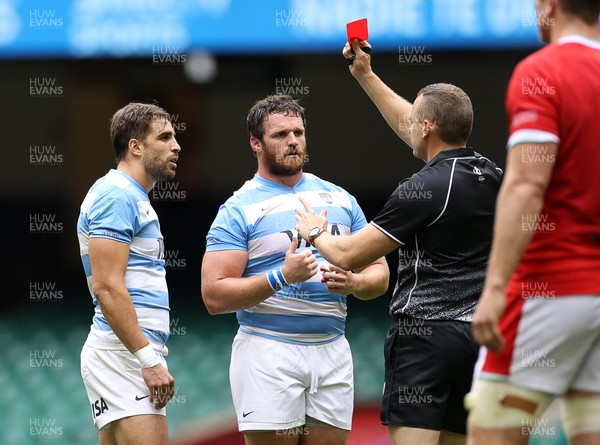 100721 - Argentina v Wales - Summer International Series - Juan Cruz Mallia of Argentina is given a red card by Referee Matthew Carley