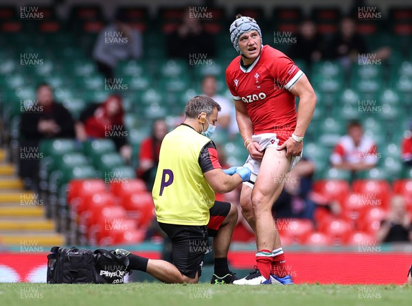 100721 - Argentina v Wales - Summer International Series - Jonathan Davies of Wales is seen to by medics on the pitch