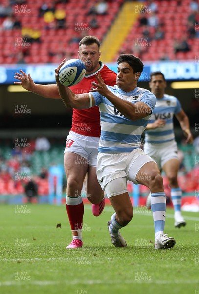 100721 - Argentina v Wales, Summer International First Test - Owen Lane of Wales puts Santiago Carreras of Argentina under pressure as they compete for the ball