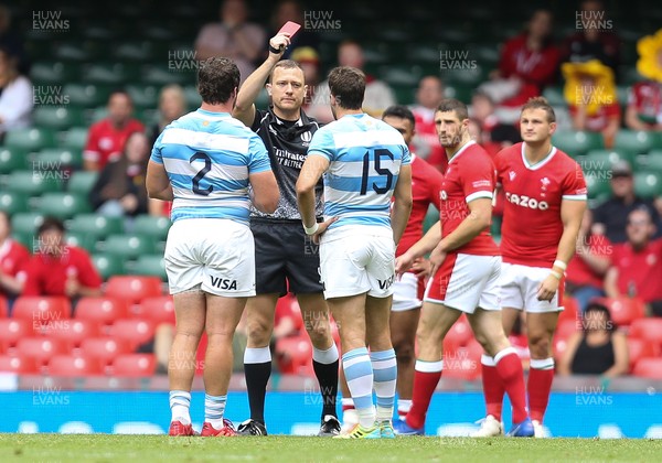 100721 - Argentina v Wales, Summer International First Test - Juan Cruz Mallia of Argentina, 15, is shown a red card for his challenge on Kieran Hardy of Wales 