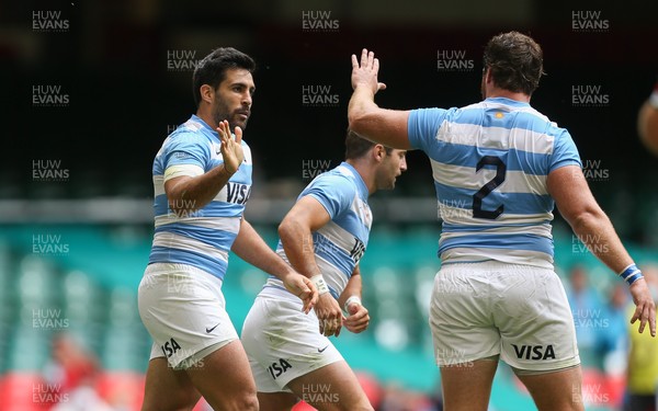 100721 - Argentina v Wales, Summer International First Test - Jeronimo de la Fuente of Argentina is congratulated by Julian Montoya of Argentina after scoring try