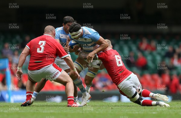 100721 - Argentina v Wales, Summer International First Test - Guido Petti of Argentina is tackled by Ross Moriarty of Wales