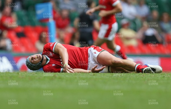 100721 - Argentina v Wales, Summer International First Test - Jonathan Davies of Wales reacts after taking a knock