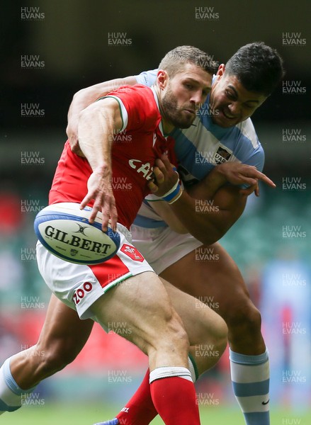 100721 - Argentina v Wales, Summer International First Test - Jonah Holmes of Wales is tackled by Santiago Chocobares of Argentina