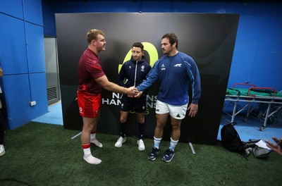 110726 - Argentina v Wales - Nations Championship - Dewi Lake of Wales and Julian Montoya of Argentina with Referee Paul Williams at the coin toss